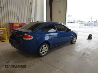 2008 Ford Focus SE with VIN 1FAHP33NX8W133127, listed as a IAAI auction lot 42139364 with 193,882 mi miles. Bid and sale history available at carsss.com. Image 4.