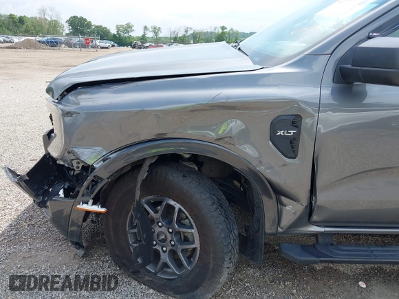 2024 Ford Ranger XLT z VIN 1FTER4HH3RLE16911, wystawiony jako IAAI lot #42596544 z przebiegiem 16 657 mil mil oraz . Historia ofert i sprzedaży dostępna na DreamBid. Obrazek 18.