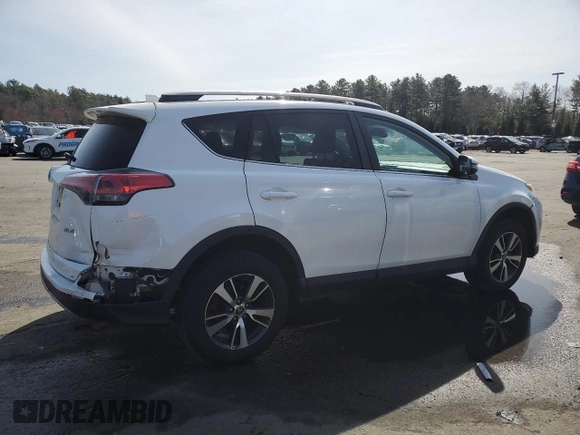 2018 Toyota RAV4 XLE with VIN 2T3WFREV4JW476959, listed as a Copart auction lot 51593265 with 198,596 mi miles and Salvage Title. Bid and sale history available at DreamBid. Image 3.