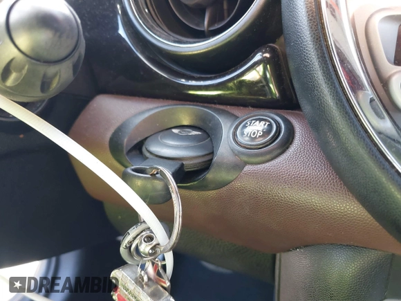 2010 MINI Convertible with VIN WMWMR3C50ATU97550, listed as a IAAI auction lot 41709012 with 86,499 mi miles and . Bid and sale history available at DreamBid. Image 11.