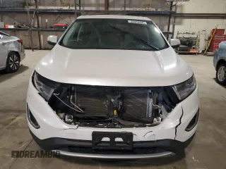 2015 Ford Edge Titanium z VIN 2FMTK3K91FBB08263, wystawiony jako Copart lot #55448405 z przebiegiem 135 788 mil mil oraz Szkoda całkowita • Salvage title. Historia ofert i sprzedaży dostępna na DreamBid. Obrazek 5.