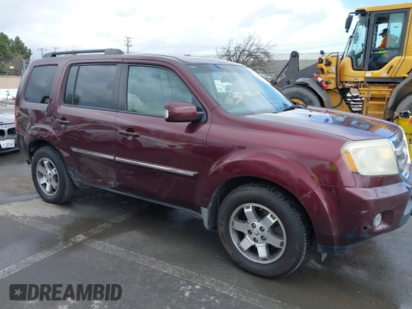 2009 Honda Pilot Touring with VIN 5FNYF48959B007813, listed as a IAAI auction lot 41823645 with 200,571 mi miles and . Bid and sale history available at carsss.com. Image 1.