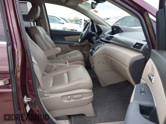 2014 Honda Odyssey Touring with VIN 5FNRL5H9XEB073156, listed as a IAAI auction lot 41990714 with 166,129 mi miles and . Bid and sale history available at DreamBid. Image 5.