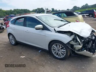 2015 Ford Focus Titanium with VIN 1FADP3N22FL365477, listed as a IAAI auction lot 37461727 with Not provided miles and . Bid and sale history available at DreamBid. Image 1.
