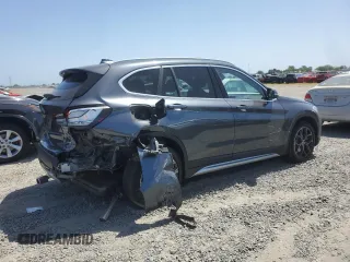 2020 BMW X1 xDrive28i с VIN WBXJG9C06L5R54942, выставлен на аукционе Copart как лот 54262435 с пробегом 65 217 миль миль и Списание • Salvage title. История ставок и продаж доступна на DreamBid. Изображение 3.