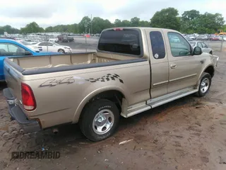 2000 Ford F-150 XL with VIN 1FTRX18L2YNA47066, listed as a IAAI auction lot 42127285 with 1 mi miles. Bid and sale history available at carsss.com. Image 4.