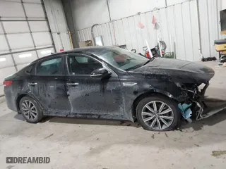 2019 Kia Optima LX with VIN 5XXGT4L3XKG377990, listed as a IAAI auction lot 41636972 with 140,864 mi miles. Bid and sale history available at carsss.com. Image 14.