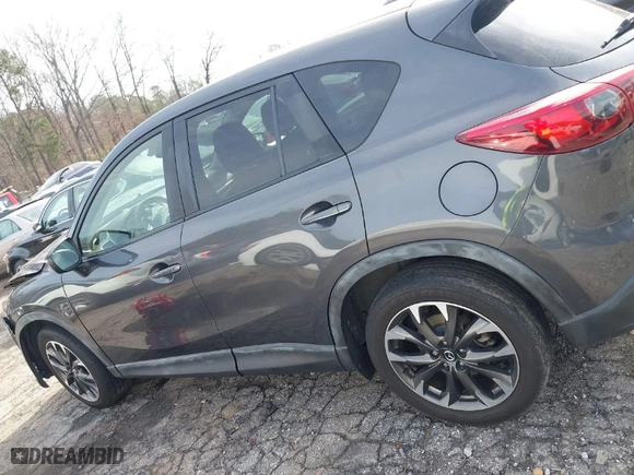 2016 Mazda CX-5 Grand Touring with VIN JM3KE4DY5G0836891, listed as a IAAI auction lot 41441065 with NaN miles. Bid and sale history available at carsss.com. Image 14.