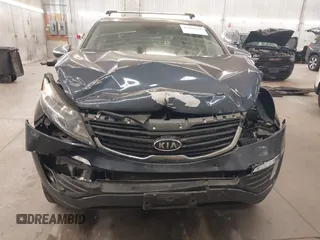 2011 Kia Sportage EX with VIN KNDPCCA27B7037886, listed as a IAAI auction lot 42264598 with 211,538 mi miles and . Bid and sale history available at DreamBid. Image 6.