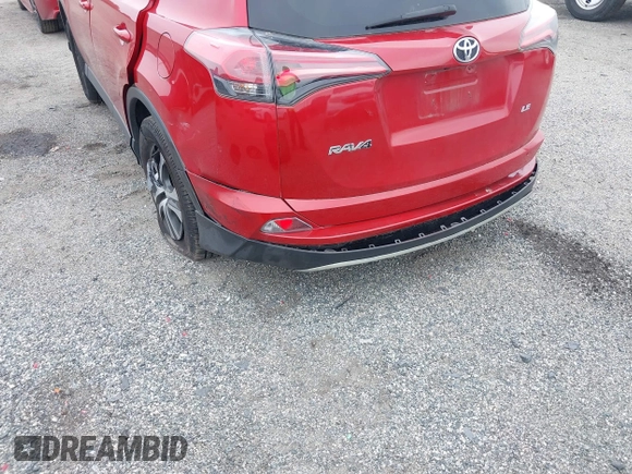 2017 Toyota RAV4 LE with VIN JTMBFREV8HJ161427, listed as a IAAI auction lot 42333851 with 121,161 mi miles and . Bid and sale history available at DreamBid. Image 6.