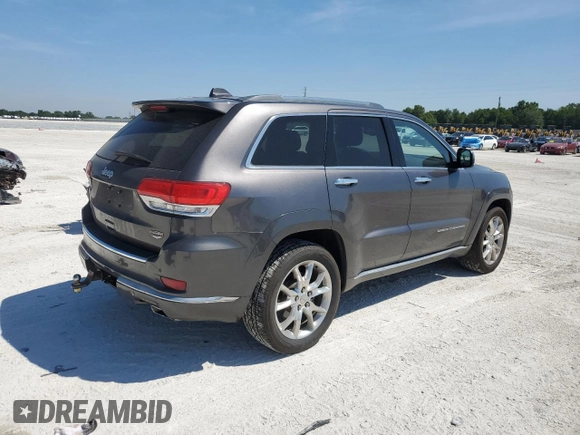 2014 Jeep Grand Cherokee Summit with VIN 1C4RJFJGXEC159438, listed as a Copart auction lot 50864595 with 134,558 mi miles and Salvage title. Bid and sale history available at DreamBid. Image 3.