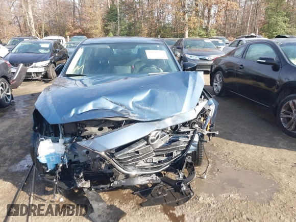 2015 Mazda 3 i SV with VIN JM1BM1T78F1271497, listed as a IAAI auction lot 40878398 with 127,617 mi miles. Bid and sale history available at carsss.com. Image 13.