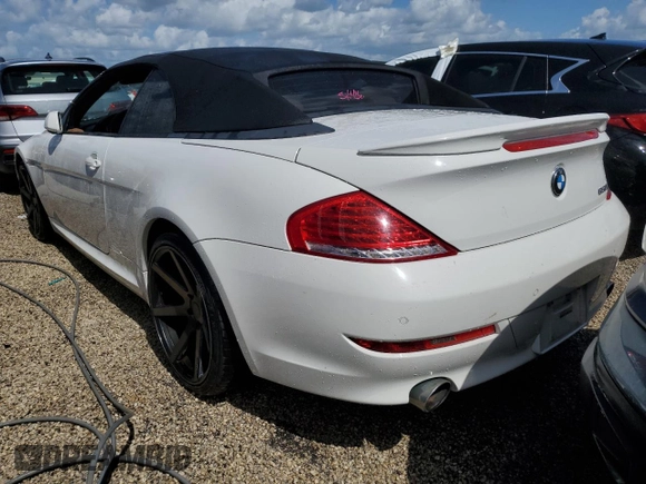 2009 BMW 6 Series 650i with VIN WBAEB53589CX64448, listed as a Copart auction lot 73867784 with 80,795 mi miles and Salvage Title. Bid and sale history available at carsss.com. Image 6.