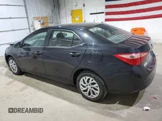 2019 Toyota Corolla L with VIN 2T1BURHE5KC185821, listed as a Copart auction lot 52613985 with 104,208 mi miles and Salvage title. Bid and sale history available at DreamBid. Image 2.