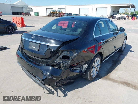2018 Mercedes-Benz E 300 with VIN WDDZF4JB2JA351345, listed as a IAAI auction lot 41974757 with 53,948 mi miles and . Bid and sale history available at DreamBid. Image 4.