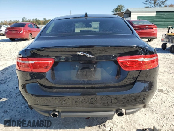 2017 Jaguar XE 25t Premium with VIN SAJAD4BG1HA966889, listed as a Copart auction lot 81849404 with 77,086 mi miles and Salvage Title. Bid and sale history available at carsss.com. Image 6.