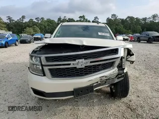 2015 Chevrolet Tahoe LT with VIN 1GNSCBKC9FR220574, listed as a Copart auction lot 54788555 with 244,491 mi miles and Salvage title. Bid and sale history available at DreamBid. Image 14.