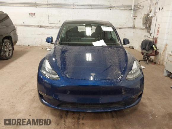 2021 Tesla Model Y Long Range with VIN 5YJYGDEE2MF185945, listed as a IAAI auction lot 41599029 with 53,815 mi miles and . Bid and sale history available at DreamBid. Image 13.