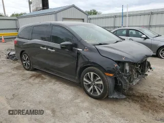 2018 Honda Odyssey Elite with VIN 5FNRL6H92JB024856, listed as a Copart auction lot 52409895 with 123,264 mi miles and Salvage title. Bid and sale history available at DreamBid. Image 4.
