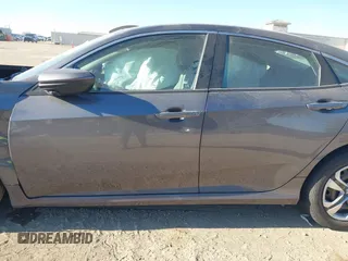 2016 Honda Civic Sedan LX with VIN 2HGFC2F55GH546980, listed as a IAAI auction lot 41378567 with 145,091 mi miles. Bid and sale history available at carsss.com. Image 14.