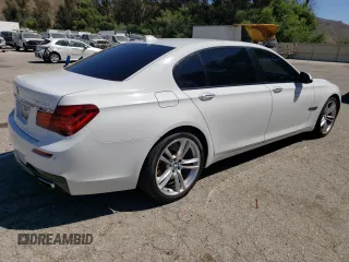 2015 BMW 7 Series 750Li z VIN WBAYE8C50FD782356, wystawiony jako Copart lot #64578895 z przebiegiem 195 656 mil mil oraz Czysty tytuł • Clean title. Historia ofert i sprzedaży dostępna na DreamBid. Obrazek 3.