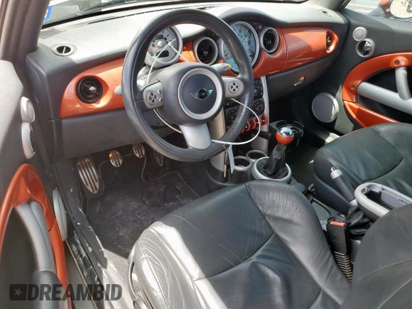 2007 MINI Convertible S with VIN WMWRH33547TJ43144, listed as a Copart auction lot 65440545 with 88,073 mi miles and Salvage title. Bid and sale history available at DreamBid. Image 8.