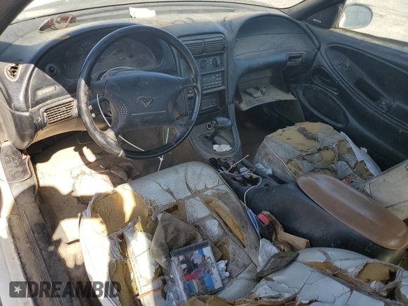 1998 Ford Mustang with VIN 1FAFP4448WF269580, listed as a Copart auction lot 54861155 with 304,869 mi miles and Salvage title. Bid and sale history available at DreamBid. Image 8.