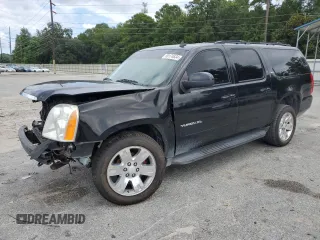 2011 GMC Yukon XL SLT with VIN 1GKS1KE09BR232187, listed as a Copart auction lot 69174634 with Not Provided miles and Salvage Title. Bid and sale history available at carsss.com. Image 1.