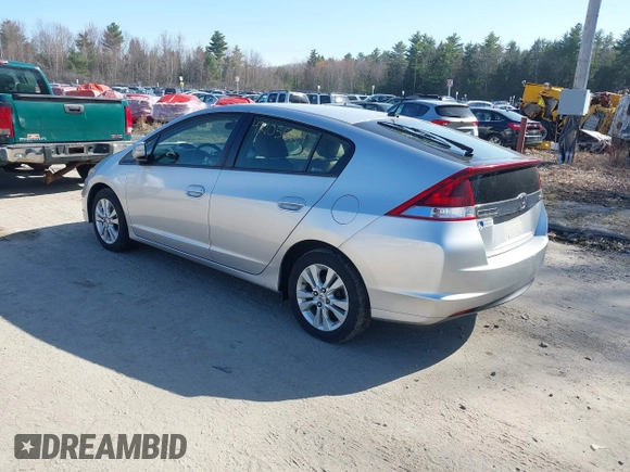 2013 Honda Insight EX z VIN JHMZE2H70DS005200, wystawiony jako IAAI lot #42105624 z przebiegiem 108 949 mil mil oraz . Historia ofert i sprzedaży dostępna na DreamBid. Obrazek 3.