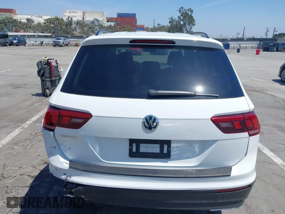 2019 Volkswagen Tiguan S with VIN 3VV1B7AX1KM101407, listed as a IAAI auction lot 42032761 with 51,868 mi miles and . Bid and sale history available at DreamBid. Image 16.