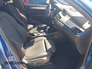 2017 BMW X1 sDrive28i with VIN WBXHU7C31H5H33281, listed as a IAAI auction lot 41814792 with 55,756 mi miles. Bid and sale history available at carsss.com. Image 5.