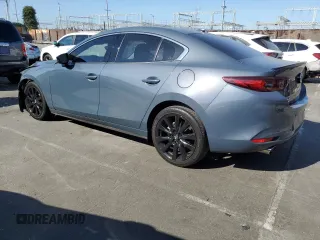2023 Mazda 3 Premium Plus with VIN 3MZBPBEY5PM374977, listed as a Copart auction lot 70642804 with 9,029 mi miles and Salvage Title. Bid and sale history available at DreamBid. Image 2.