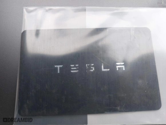 2023 Tesla Model Y Long Range with VIN 7SAYGDEE7PA023295, listed as a IAAI auction lot 41773783 with 28,079 mi miles. Bid and sale history available at carsss.com. Image 11.