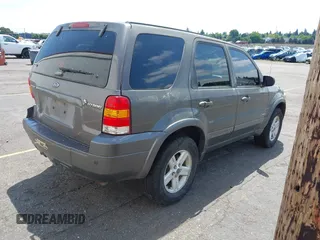 2006 Ford Escape Hybrid z VIN 1FMCU96H86KA52519, wystawiony jako IAAI lot #42443003 z przebiegiem 162 469 mil mil oraz . Historia ofert i sprzedaży dostępna na DreamBid. Obrazek 4.