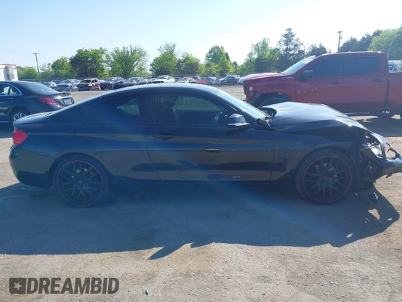 2015 BMW 4 Series 428i xDrive with VIN WBA3N9C59FK248249, listed as a IAAI auction lot 42140141 with 106,916 mi miles and . Bid and sale history available at DreamBid. Image 13.