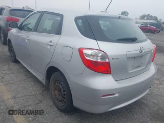 2009 Toyota Matrix with VIN 2T1KU40E49C130897, listed as a IAAI auction lot 42164096 with 140,273 mi miles. Bid and sale history available at carsss.com. Image 3.