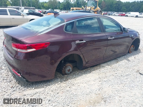 2016 Kia Optima LX with VIN 5XXGT4L3XGG040050, listed as a IAAI auction lot 42363633 with 156,999 mi miles and . Bid and sale history available at DreamBid. Image 4.