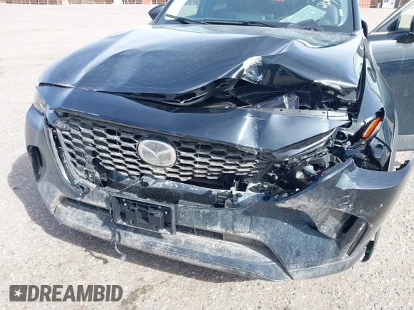 2025 Mazda CX-90 Premium Sport z VIN JM3KKCHD1S1221462, wystawiony jako IAAI lot #41765034 z przebiegiem Nie podano mil oraz . Historia ofert i sprzedaży dostępna na DreamBid. Obrazek 6.