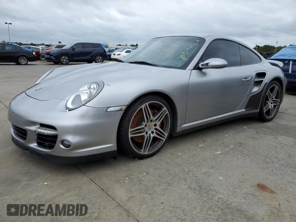 2007 Porsche 911 Turbo with VIN WP0AD29957S784485, listed as a Copart auction lot 75090564 with Not Provided miles and Salvage Title. Bid and sale history available at DreamBid. Image 1.