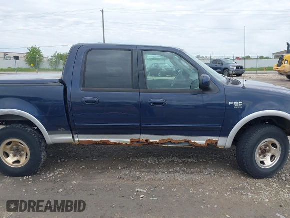 2003 Ford F-150 XLT with VIN 1FTRW08L63KD55851, listed as a IAAI auction lot 42359388 with Not provided miles and . Bid and sale history available at DreamBid. Image 13.