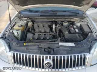 2005 Mercury Montego Premier with VIN 1MEFM43165G608323, listed as a Copart auction lot 77156404 with 138,150 mi miles and Salvage Title. Bid and sale history available at carsss.com. Image 12.