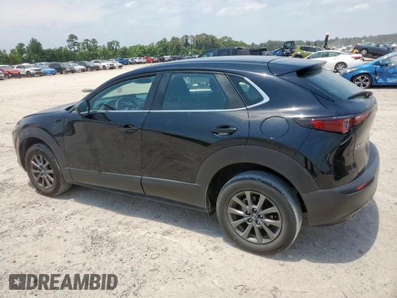 2021 Mazda CX-30 S with VIN 3MVDMAAL9MM273086, listed as a Copart auction lot 57276845 with 79,432 mi miles and Salvage title. Bid and sale history available at DreamBid. Image 2.