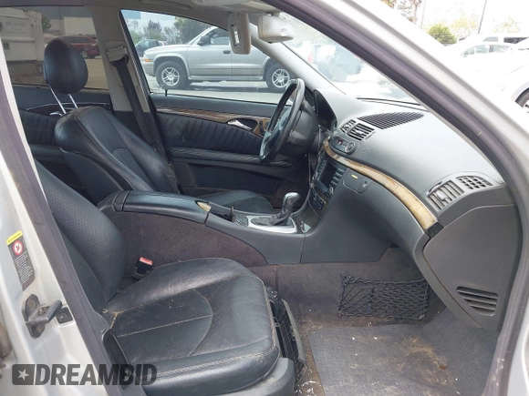 2004 Mercedes-Benz E-Class 5.0L with VIN WDBUF70J64A433838, listed as a IAAI auction lot 42108575 with 1 mi miles. Bid and sale history available at carsss.com. Image 5.