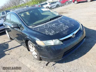 2006 Honda Civic Sdn LX with VIN 1HGFA16586L139771, listed as a IAAI auction lot 41894847 with 230,878 mi miles. Bid and sale history available at carsss.com. Image 1.