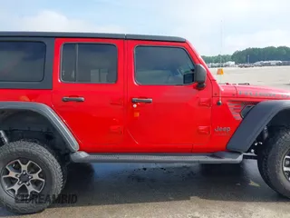 2018 Jeep Wrangler Unlimited Rubicon с VIN 1C4HJXFG6JW177115, выставлен на аукционе IAAI как лот 42357142 с пробегом 66 257 миль миль и . История ставок и продаж доступна на DreamBid. Изображение 13.
