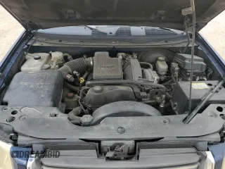 2002 GMC Envoy SLE z VIN 1GKDS13S822424858, wystawiony jako Copart lot #53609685 z przebiegiem 213 680 mil mil oraz Szkoda całkowita • Salvage title. Historia ofert i sprzedaży dostępna na DreamBid. Obrazek 13.