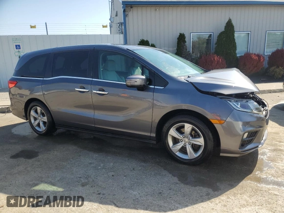 2019 Honda Odyssey EX-L with VIN 5FNRL6H77KB040597, listed as a Copart auction lot 53573445 with 110,024 mi miles and Salvage Title. Bid and sale history available at DreamBid. Image 4.