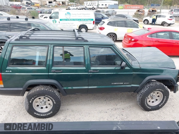 1999 Jeep Cherokee Sport with VIN 1J4FF68S1XL555463, listed as a IAAI auction lot 41898076 with 206,656 mi miles. Bid and sale history available at carsss.com. Image 13.