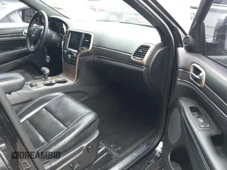 2015 Jeep Grand Cherokee Overland with VIN 1C4RJFCT4FC138404, listed as a IAAI auction lot 41188085 with 152,486 mi miles. Bid and sale history available at carsss.com. Image 5.