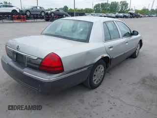 2007 Mercury Grand Marquis GS z VIN 2MEFM74V97X612947, wystawiony jako IAAI lot #42353737 z przebiegiem Nie podano mil oraz . Historia ofert i sprzedaży dostępna na DreamBid. Obrazek 4.